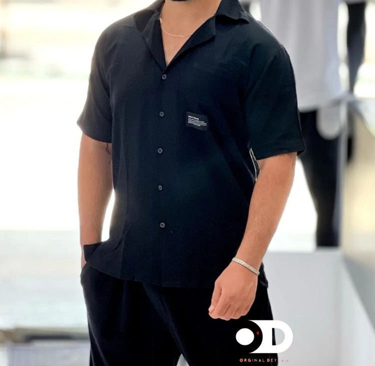 پیراهن یقه انگلیسی تک جیب پارچه بیسکوییتی رنگ مشکی