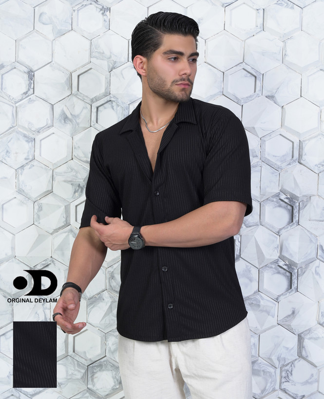 پیراهن یقه انگلیسی باکسی آستین سه ربع مشکی قواره دار بافت میله ای عمودی