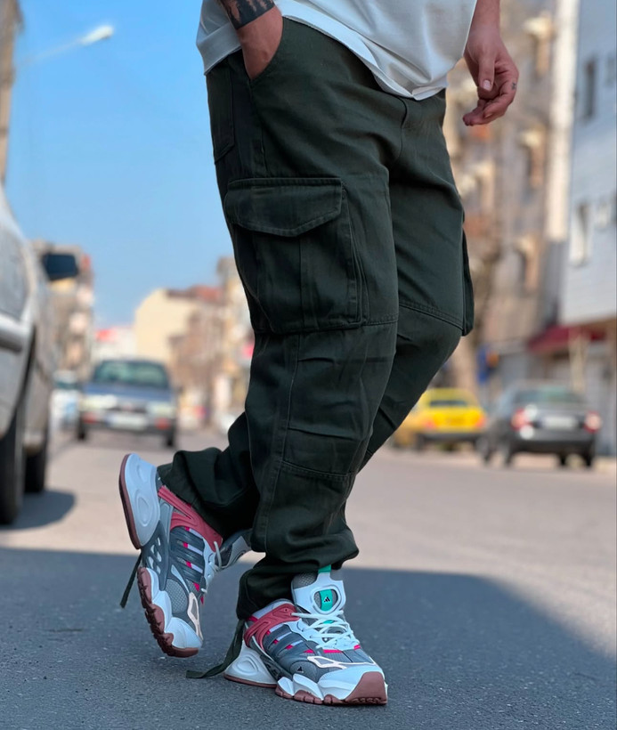 اسلش بگ کارگو مردانه رنگ سبز لجنی پارچه جین کجراه