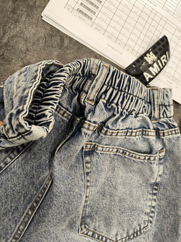 شلوار جین مردانه نیم بگ با رنگ یخی آبی روشن و کش پشت کمر