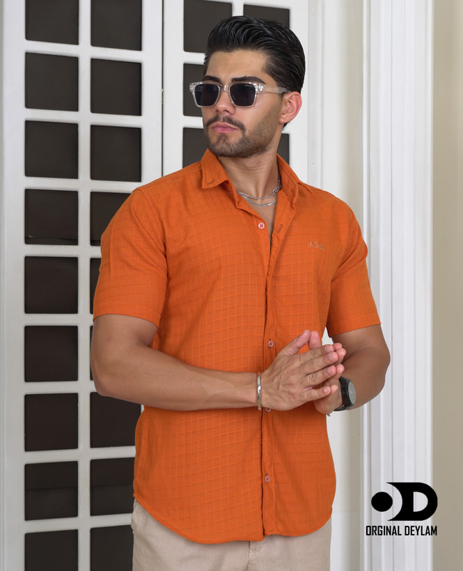 پیراهن کتان نارنجی اسپایسی اورجینال دیلم، تجلی گرما و شور زندگی در قالب یک پوشش مدرن