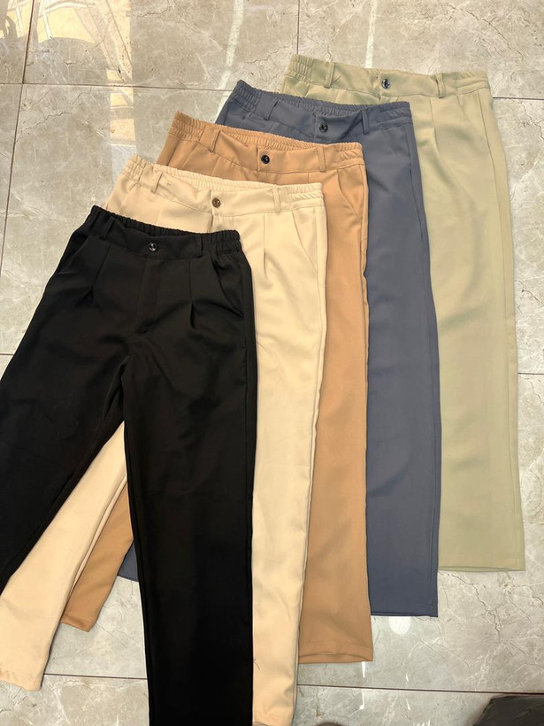 شلوار نیم بگ پارچه ای مردانه کرم پلیسه دار | ترند ۲۰۲۵