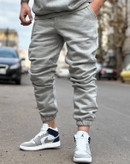 شلوار جاگر طوسی ملانژ پارچه دورس خار خورده | استایل فوقالعاده شیک ۲۰۲۵