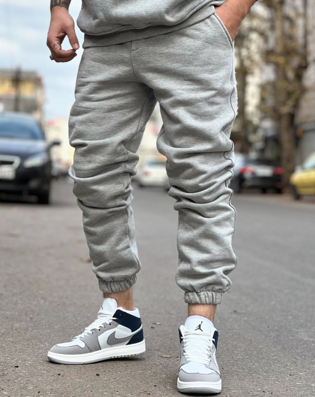 شلوار جاگر طوسی ملانژ پارچه دورس خار خورده | استایل فوقالعاده شیک ۲۰۲۵