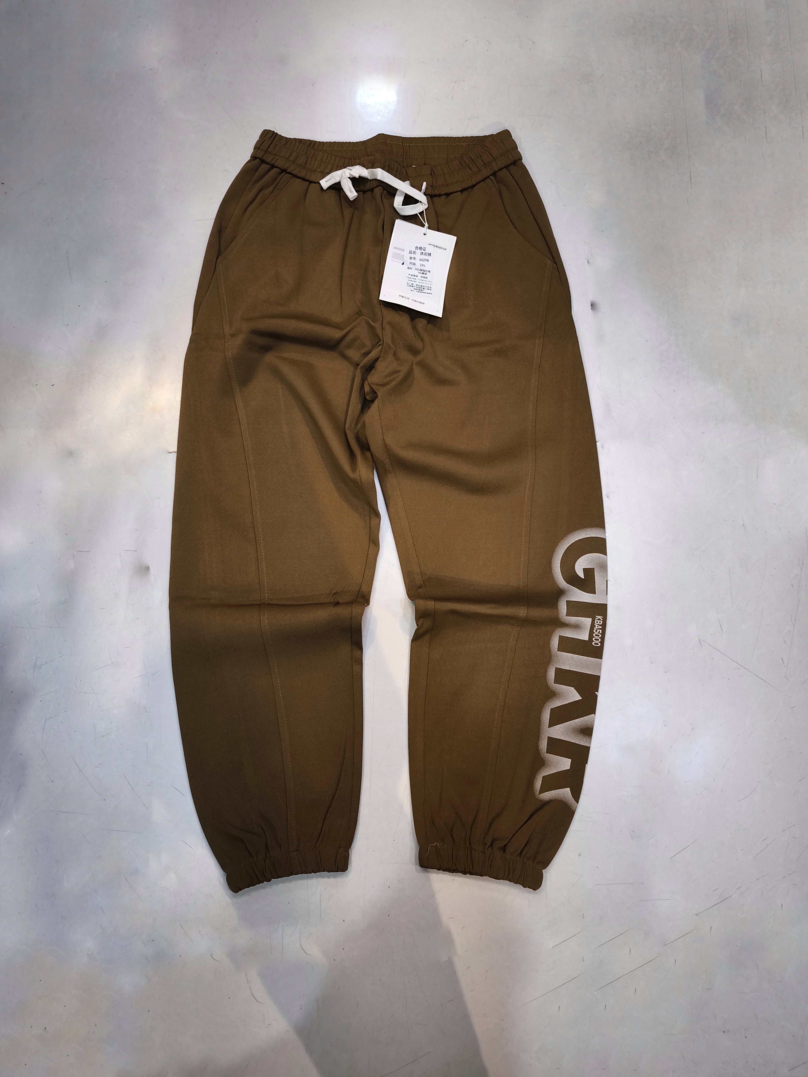 شلوار جاگر شکلاتی دمپا گتر با کپ نیم بگ * فوقالعاده شیک و با کیفیت کد 66298Moca