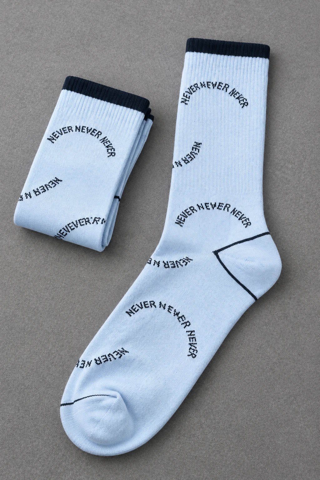 جوراب ساق بلند نانو آبی پاستیلی طرح NEVER